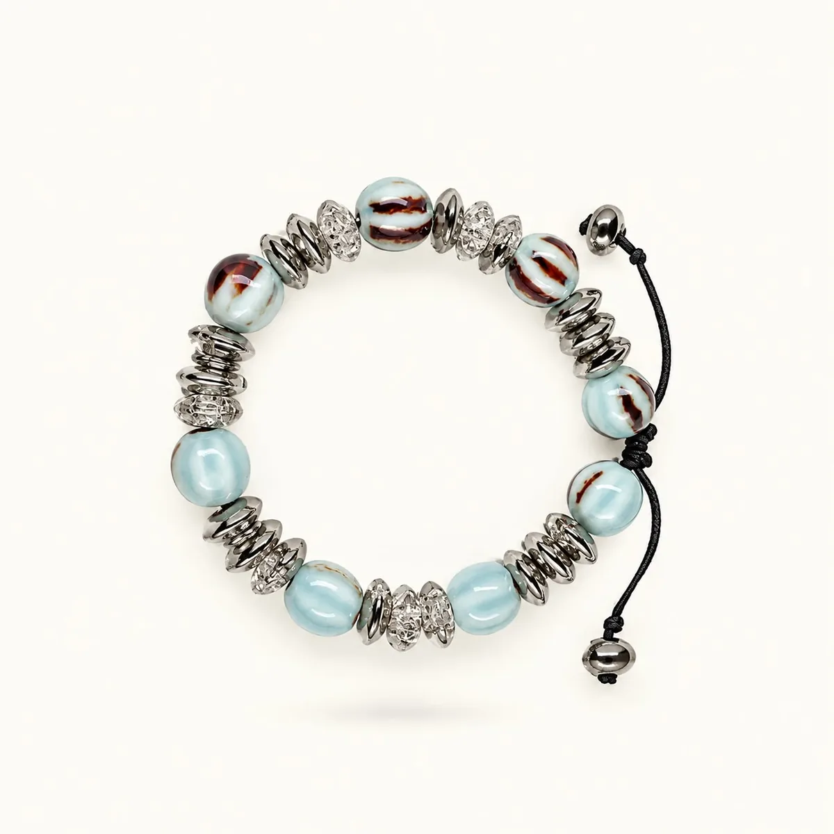 Cielo — Cerámica esmaltada, hematita y cristal, joyería artesanal hecha a mano