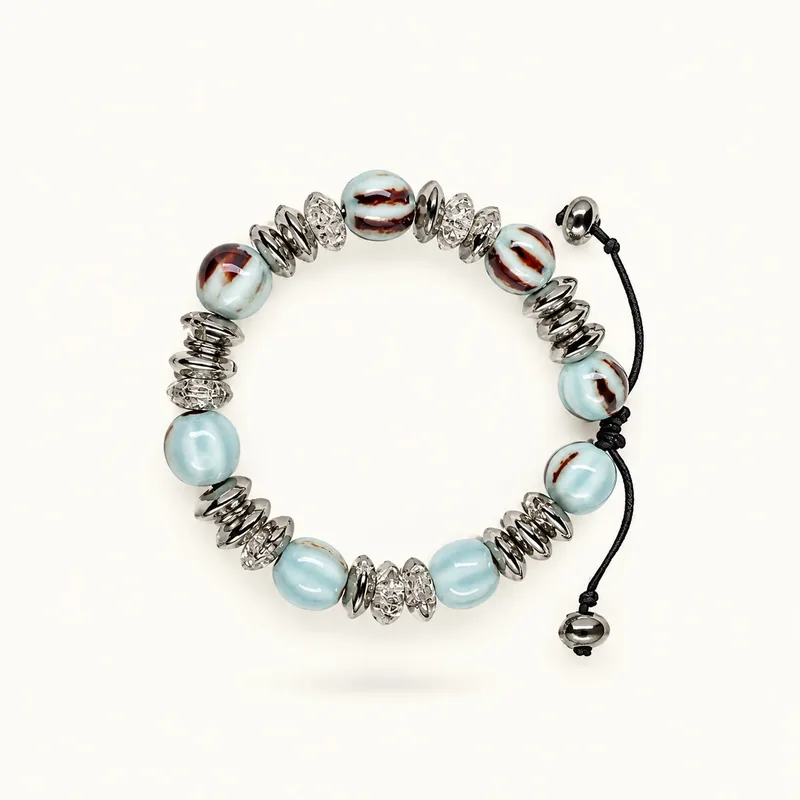 Cielo — Cerámica esmaltada, hematita y cristal, joyería artesanal Meissen Mia