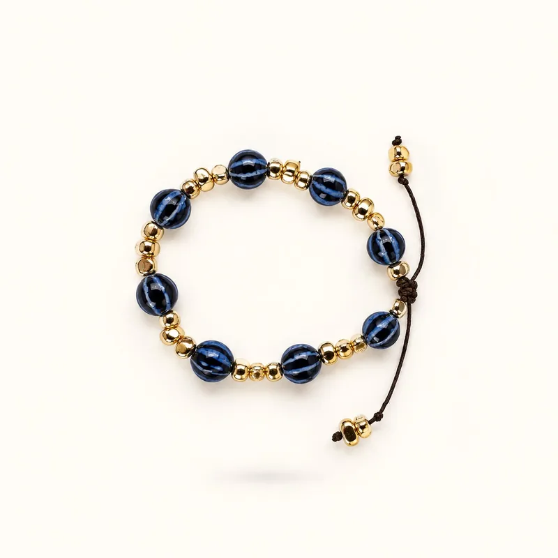 Indigo — Cerámica esmaltada y acentos de oro, joyería artesanal Meissen Mia