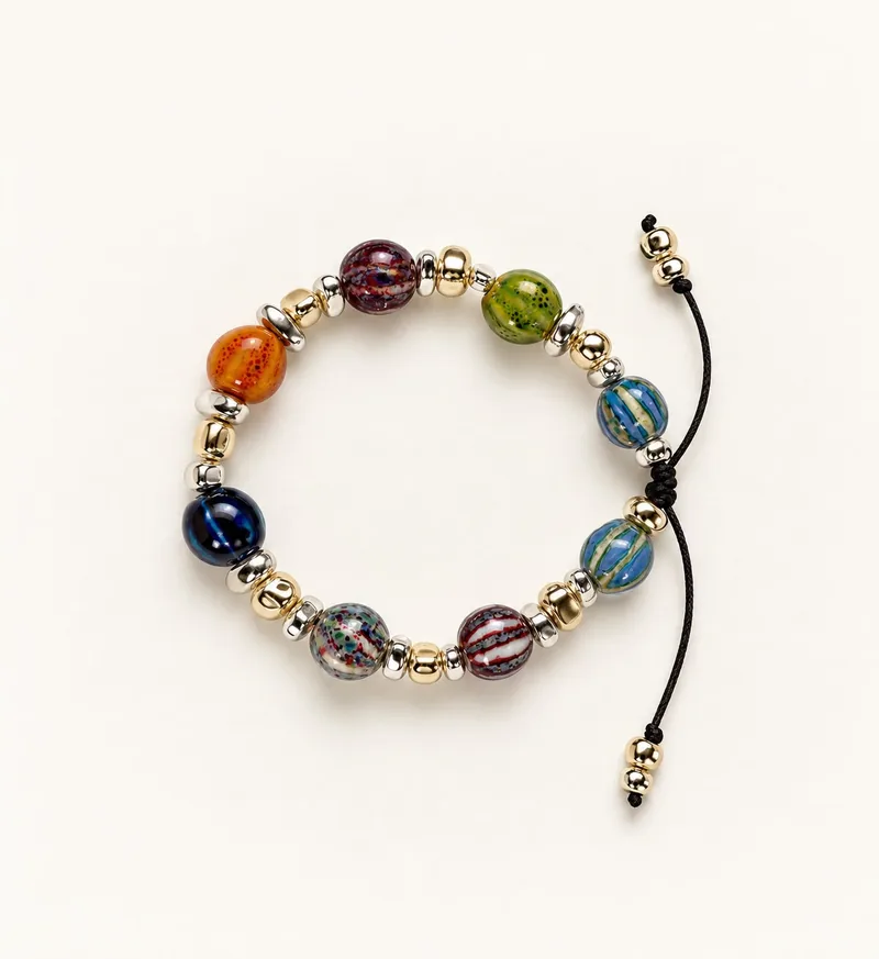 Meissen — Cerámica esmaltada, hematita y acentos de oro, joyería artesanal Meissen Mia